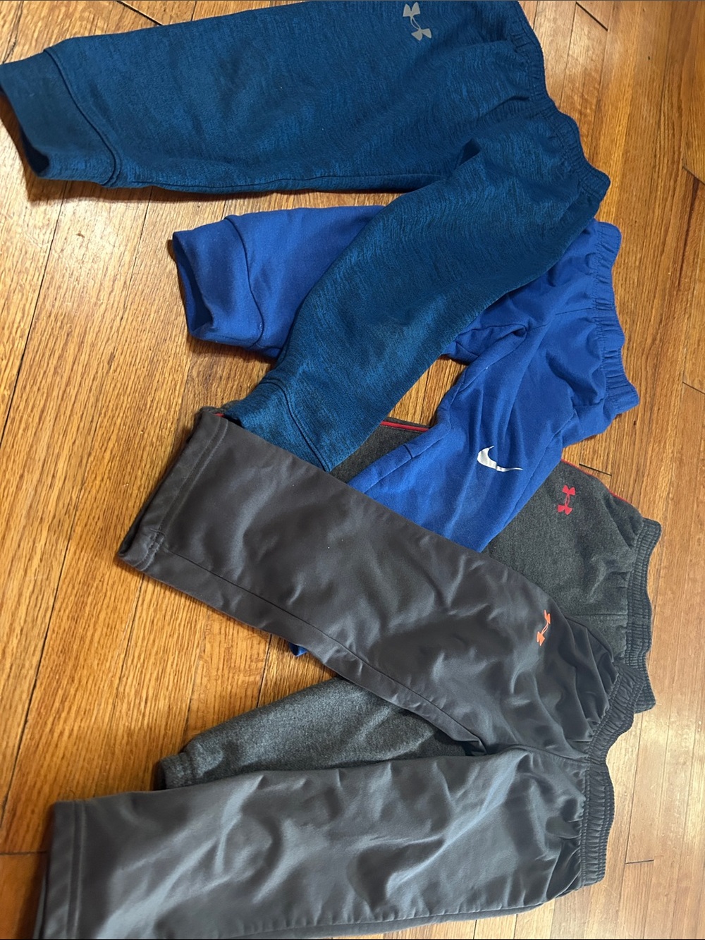 Under Armour Boys' Charcoal Gray Athletic Joggers with Orange Logo